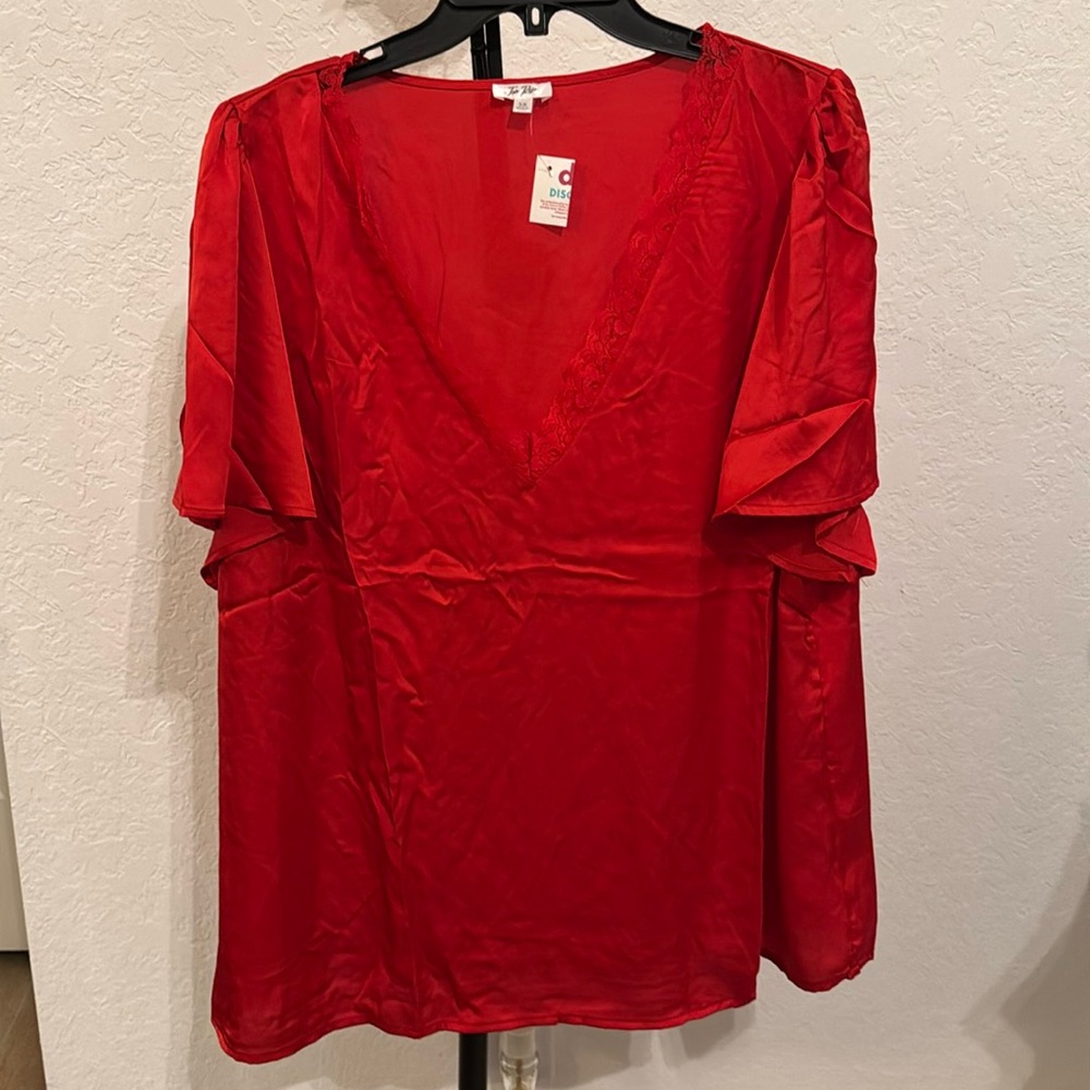 Plus size red satin blouse with v neck and lace detail!